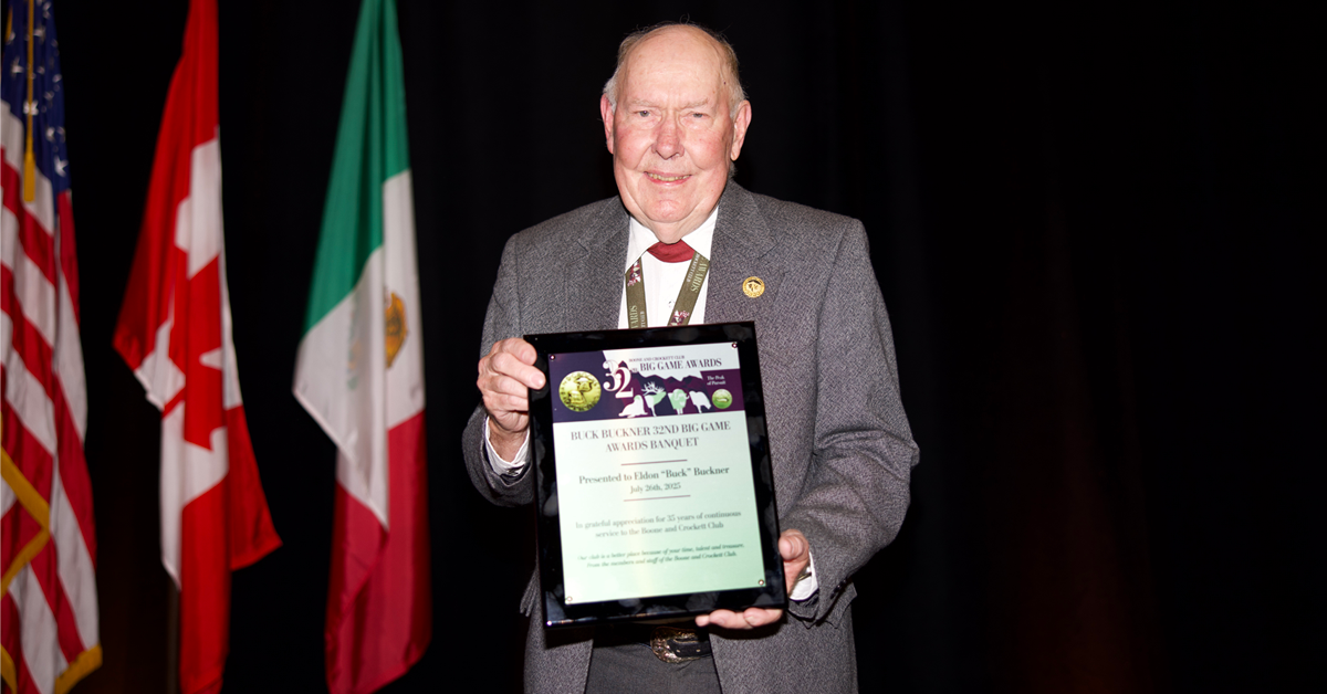 Buck Buckner was recognized on stage for years of dedication to the Club.