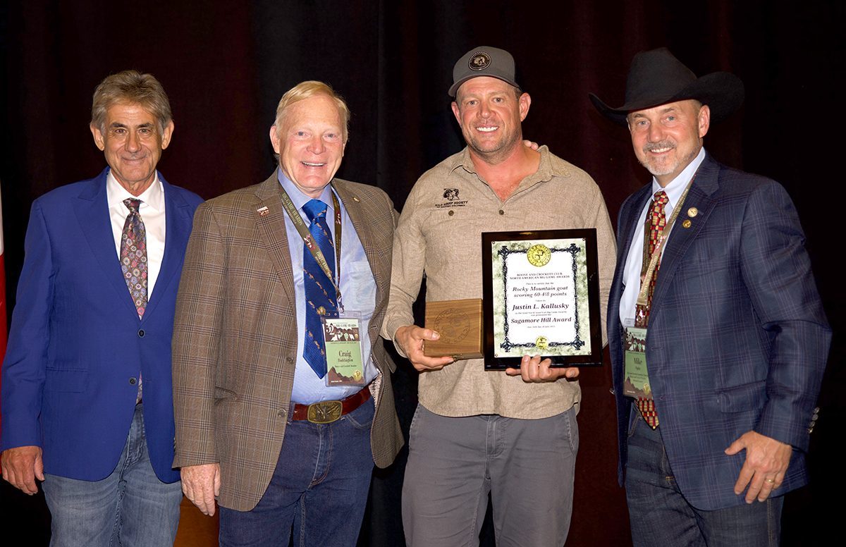 Left to Right: Boone and Crockett Club President Tony Caligiuri, Professional Member and emcee Craig Boddington, Justin Kallusky, and Big Game Records Committee Chairman Mike Opitz.
