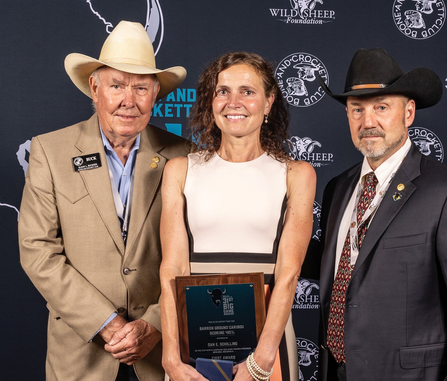 Gyongyver Schilling (center) at the 31st Big Game Awards accepts Dan's award on behalf of her late husband. Also pictured is past VP of Big Game Records Buck Buckner (left) and Chairman Mike Opitz (right). She (and Dan) received a standing ovation.