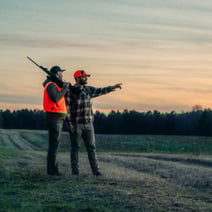 hunters in field