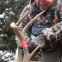 hunter with deer antler