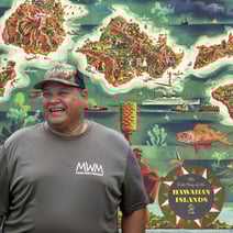 man smiling with illustrator of Hawaiian islands