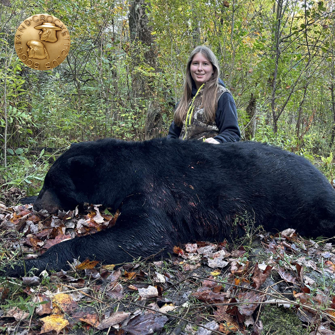 Woman with black bear
