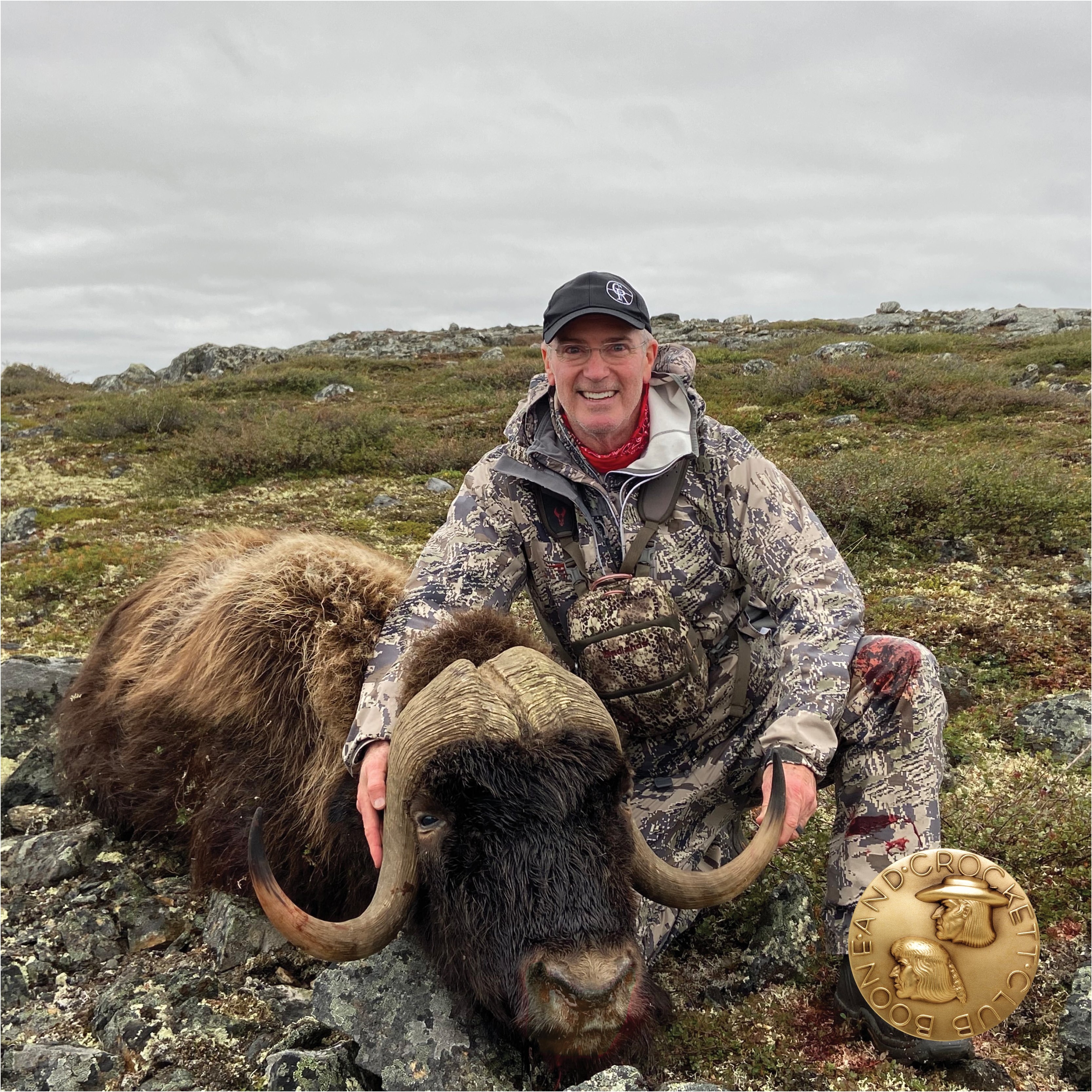 man with musk ox