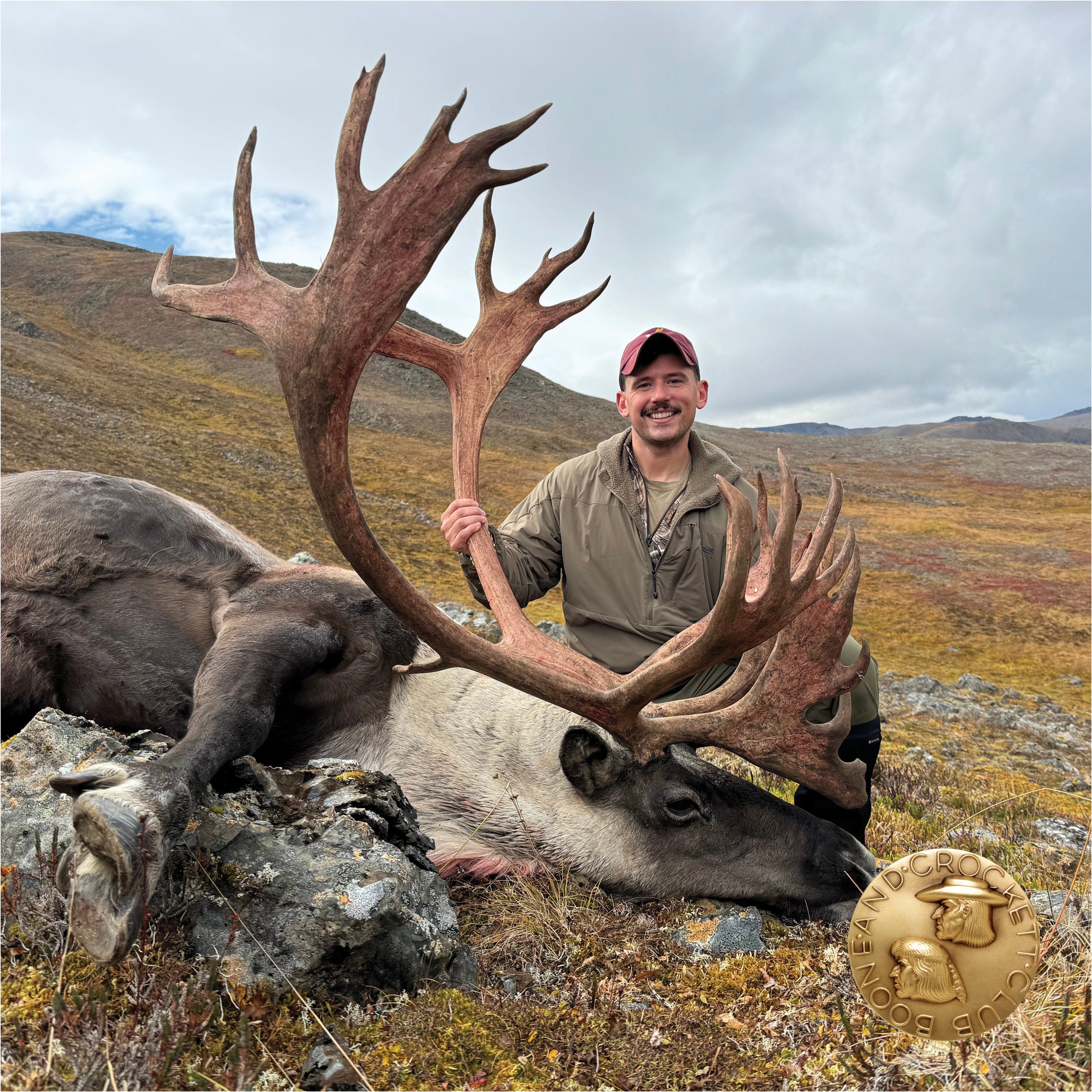 man with caribou