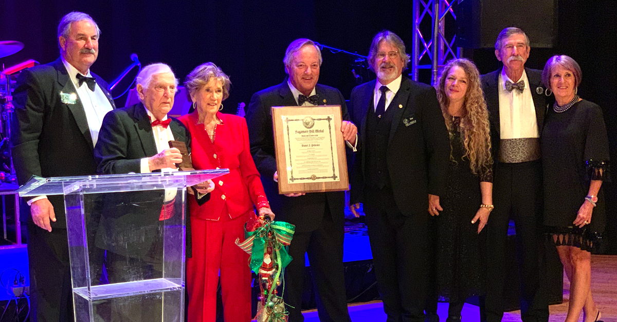 Dan Pedrotti with his family at the Club's Annual Meeting in New Orleans in 2021 where he recieved his Sagamore Hill Award.