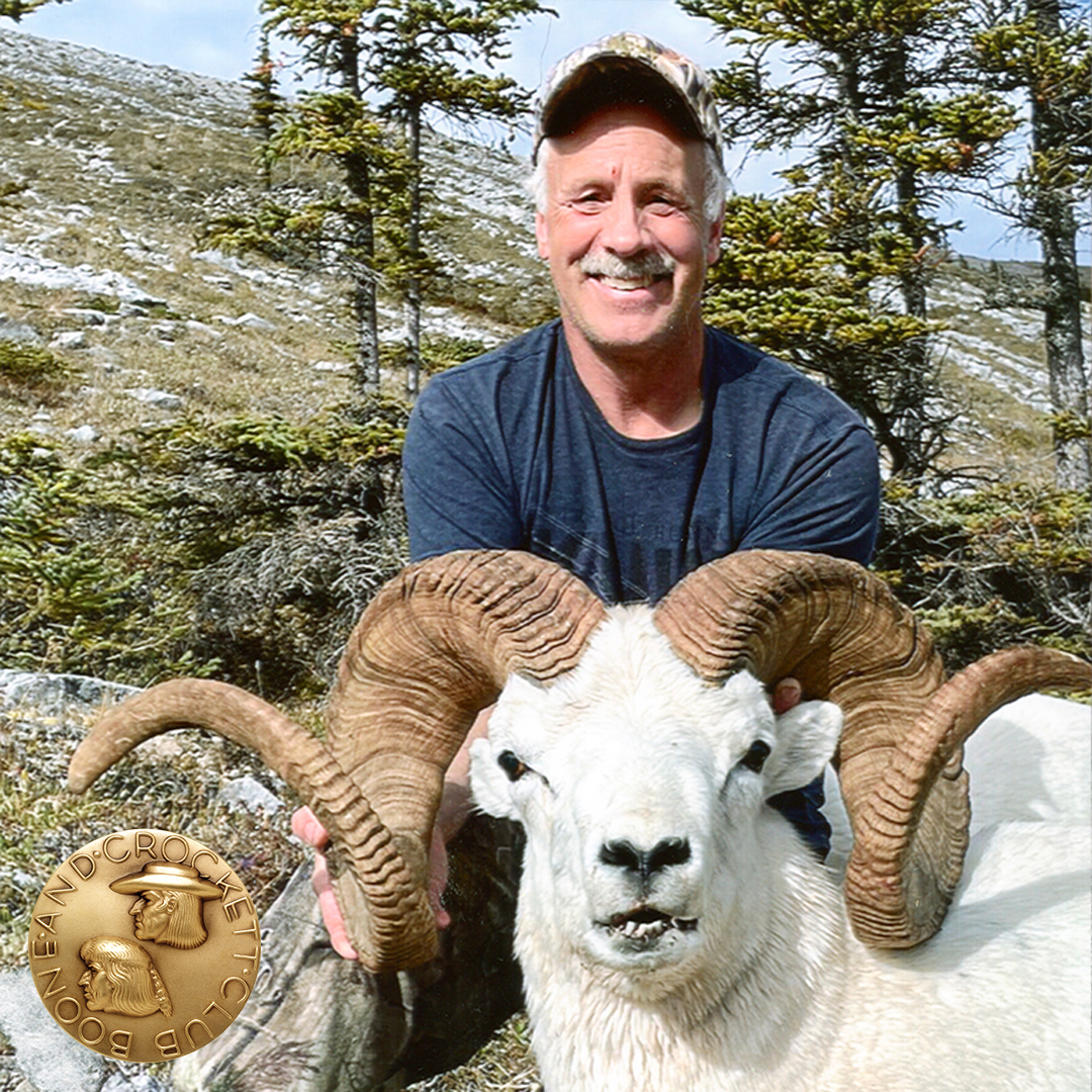 man with dall's sheep