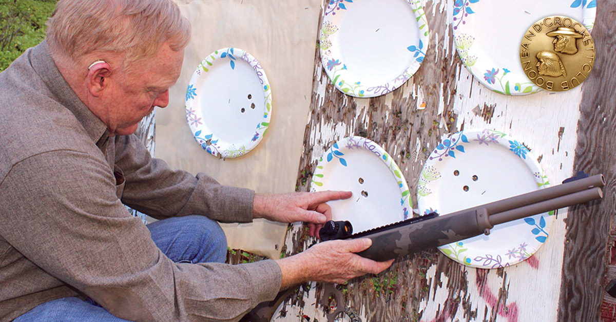 man shooting at range