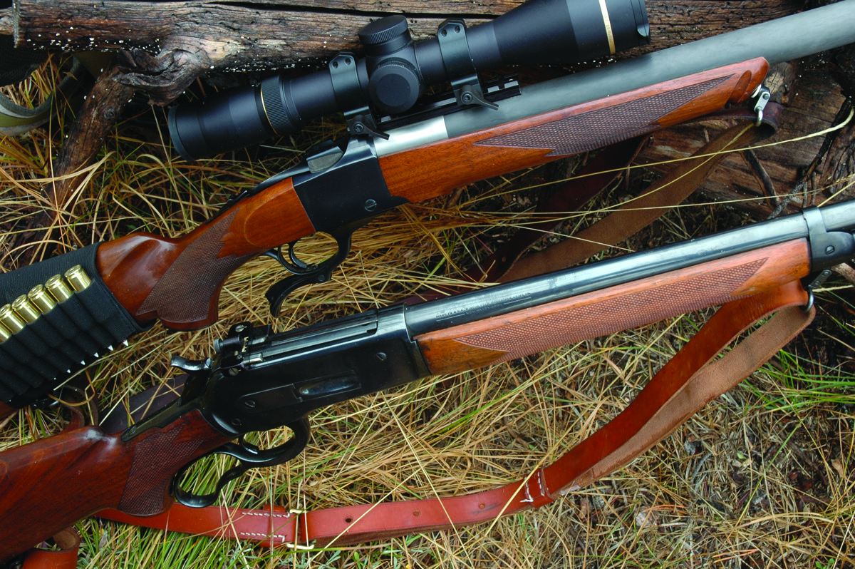 two hunting rifles