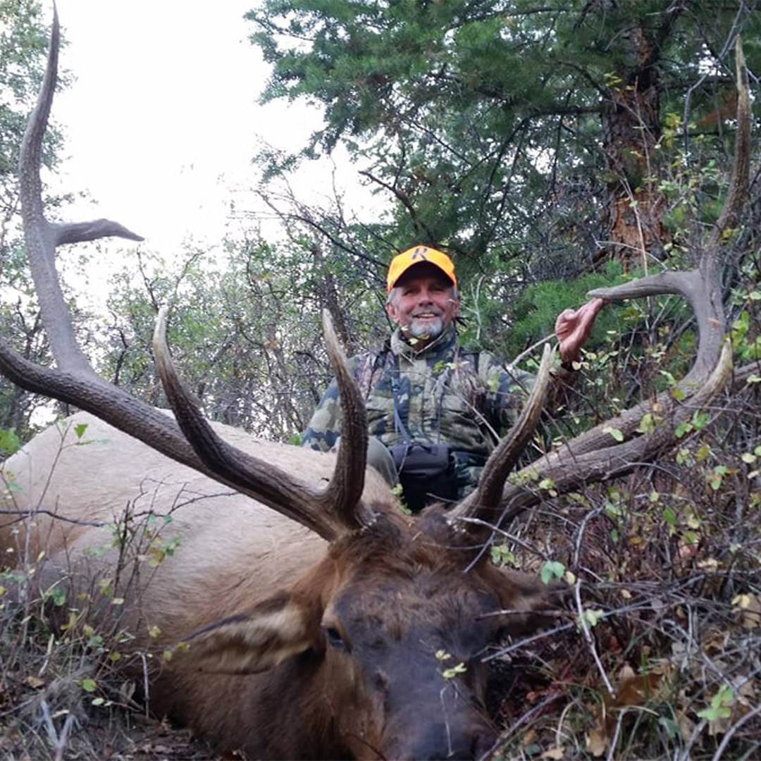 man with elk