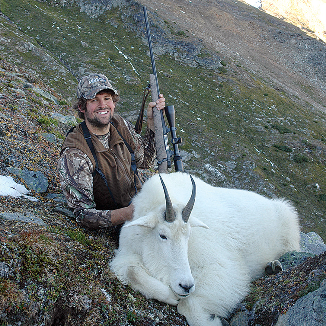 hunter with mountain goat