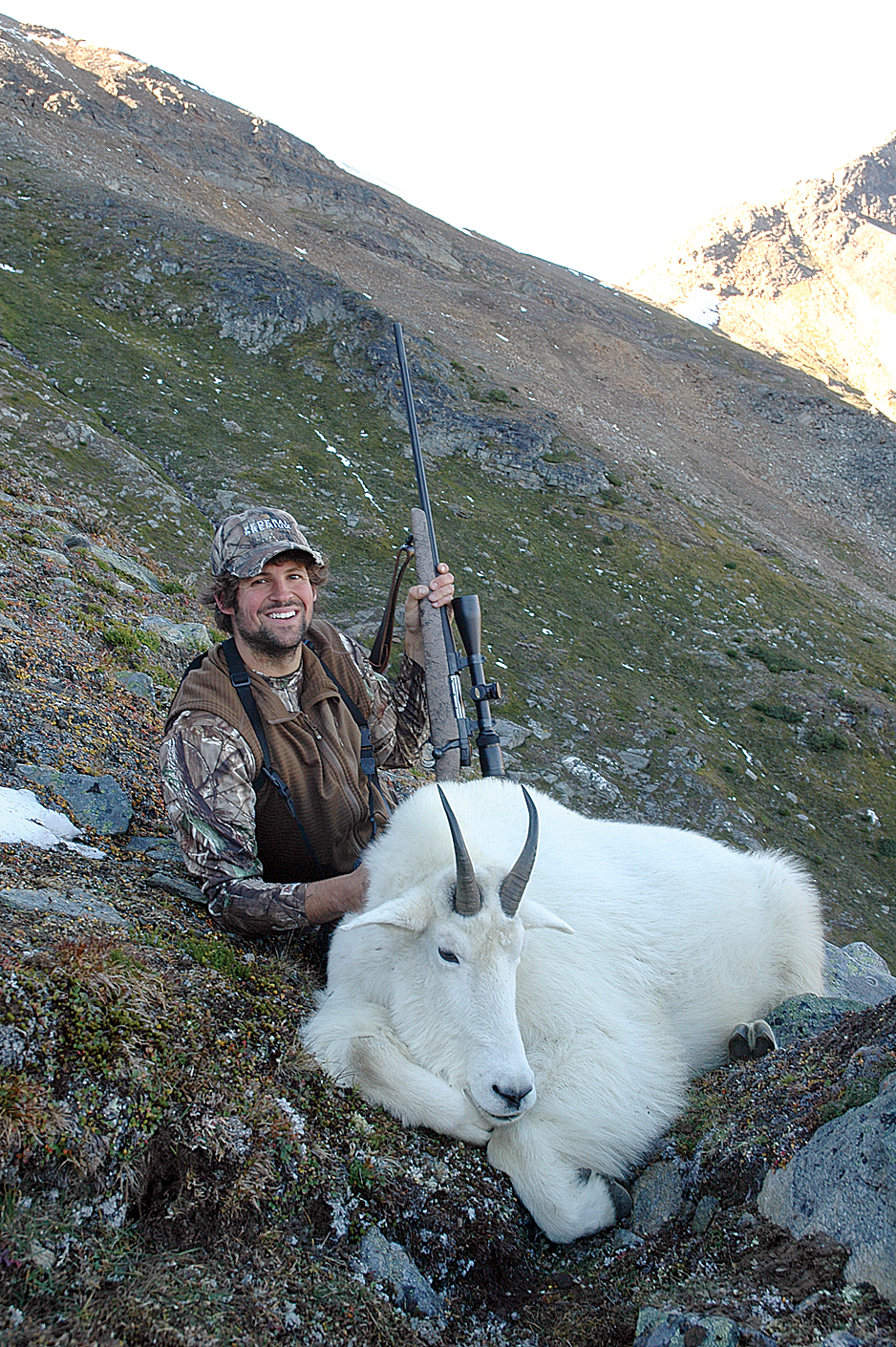 hunter with mountain goat