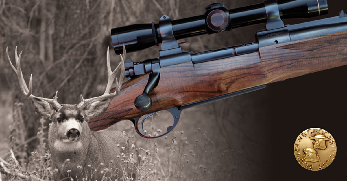 old winchester model 70 rifles with mule deer