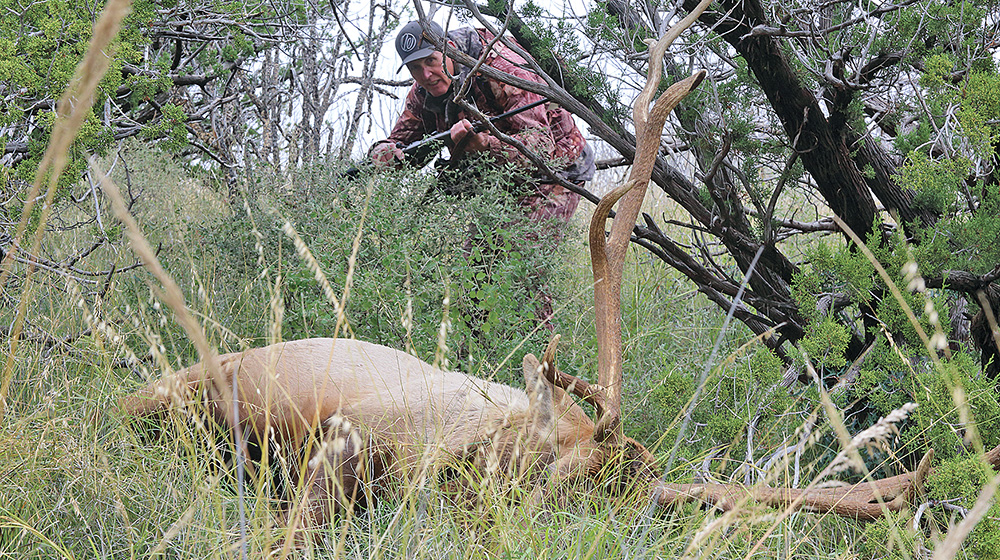 hunter with elk