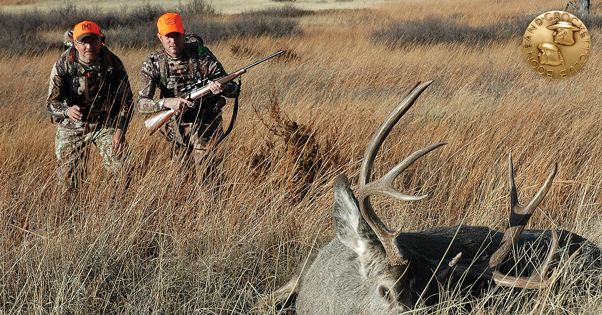 hunters and mule deer