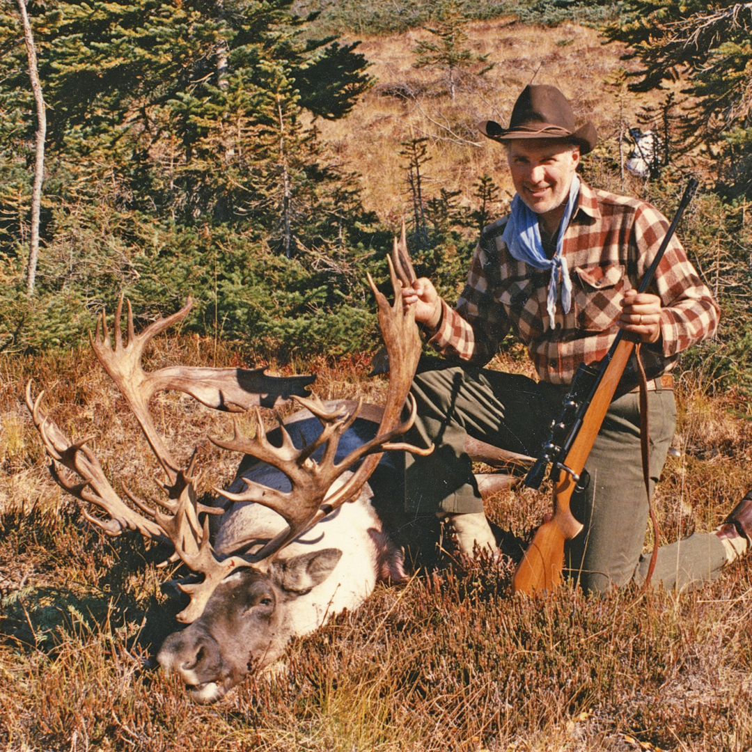 hunter with harvested caribou
