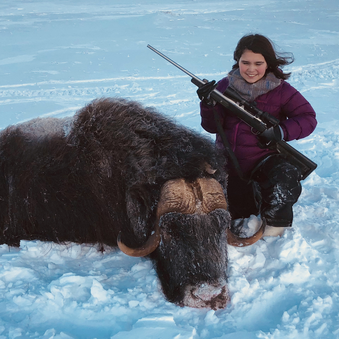 Kamylee Swaltersy and her harvested musk ox