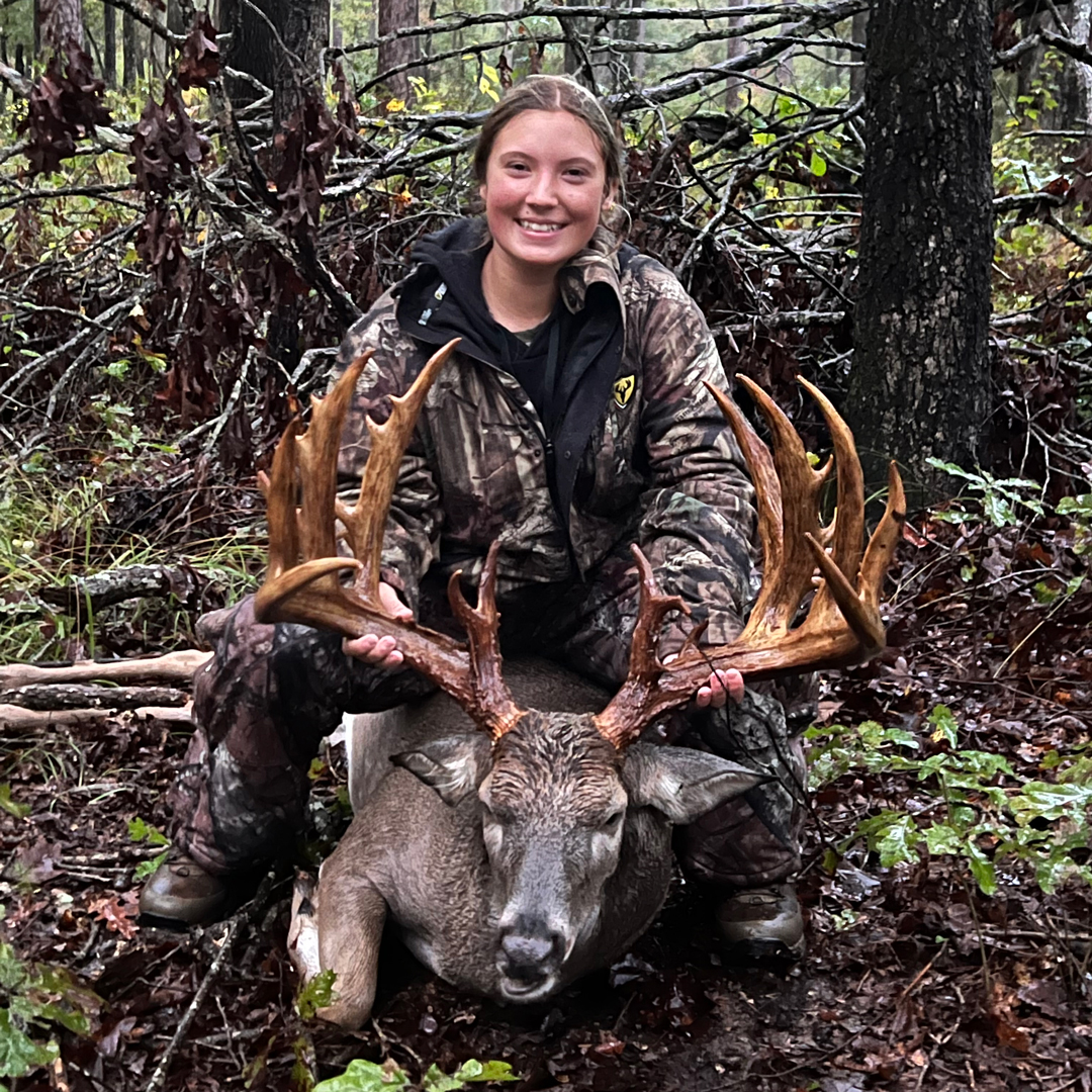 Reili Brewer with her harvested non-typical whitetail deer