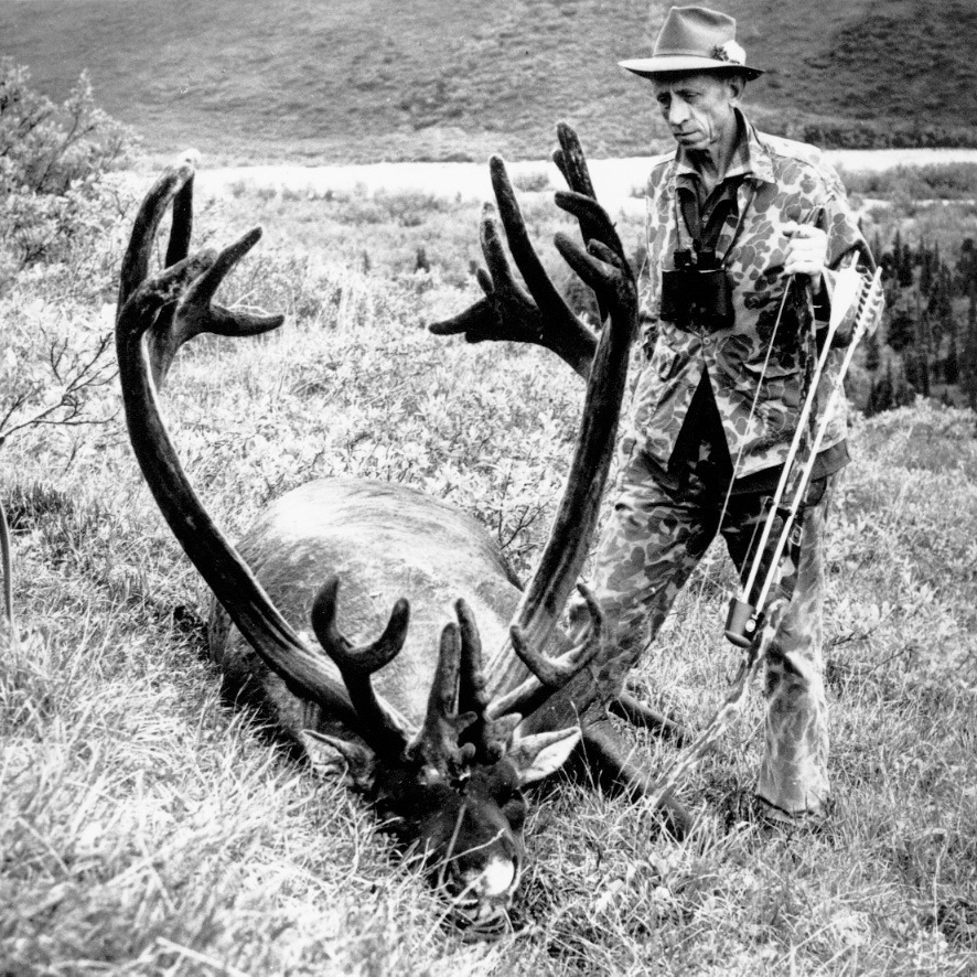Fred Bear with his harvested caribou