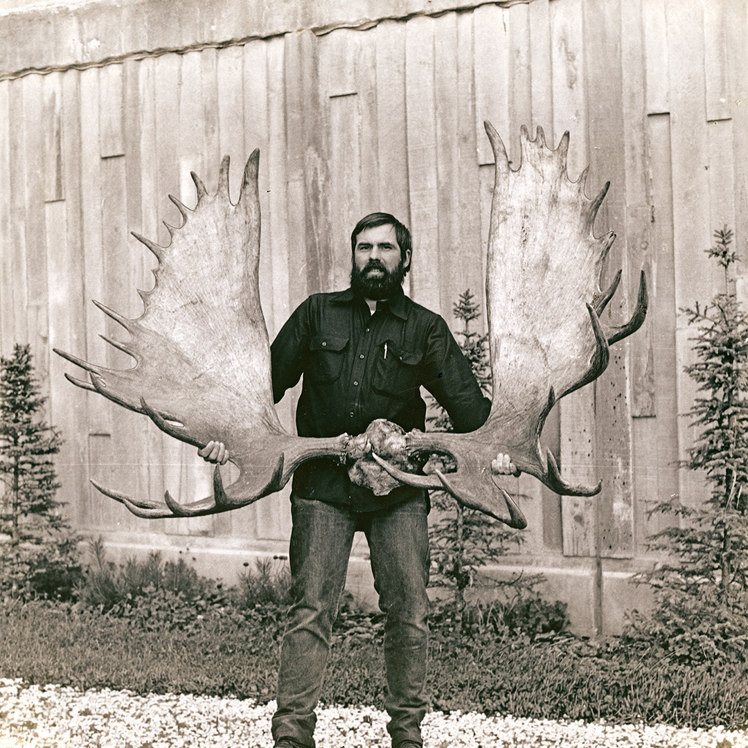 Kenneth Best with holding moose paddles