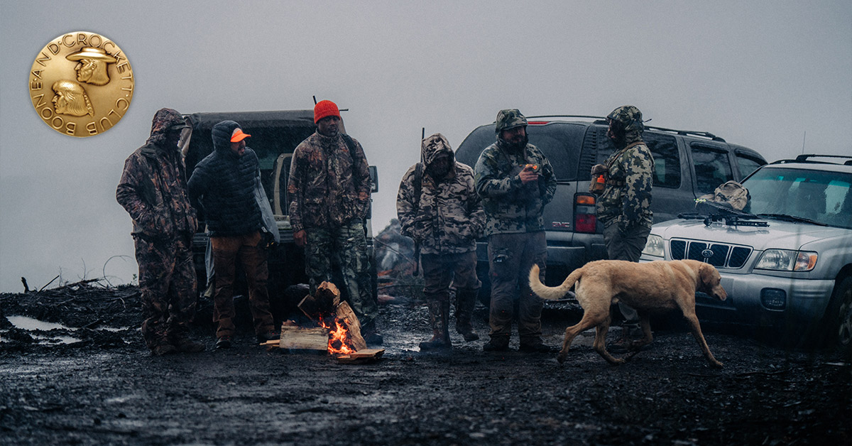 hunters around campfire
