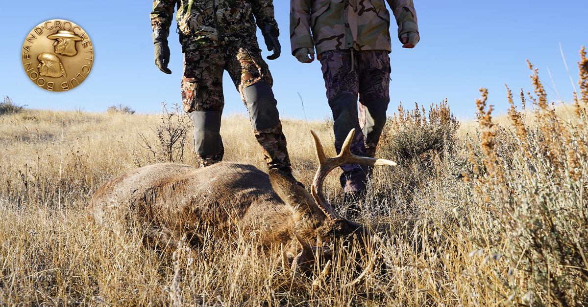 two hunters walking to harvest