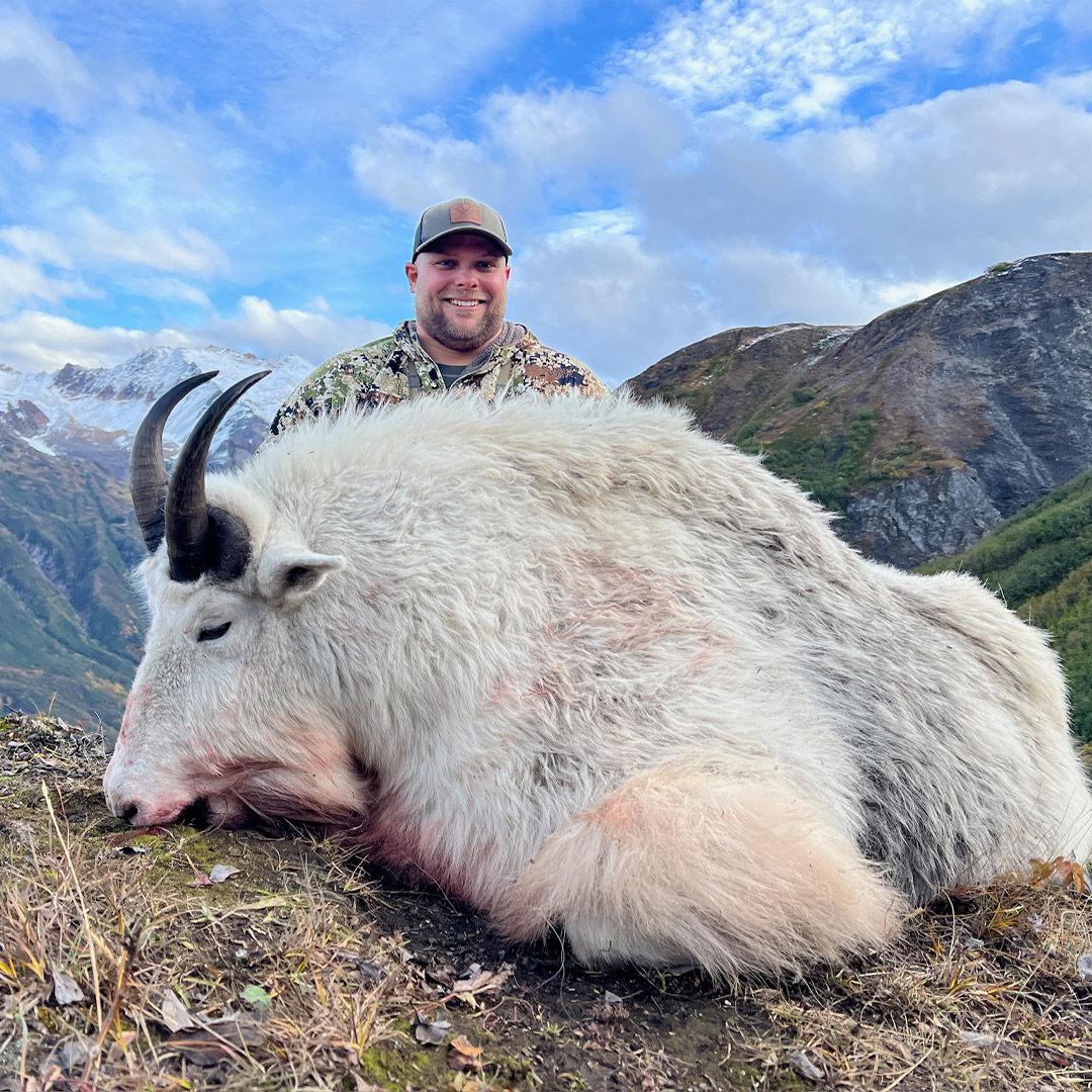 hunter with Rocky Mountain Goat