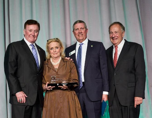 Richard Childress (left) was presented with the Dingell-Young Sportsmen's Legacy Award by Rep. (D-MI, 06) Debbie Dingell. Also pictured are CSF President and CEO and Boone and Crockett Club Professional Member Jeff Crane, and Boone and Crockett Regular Member Johnny Morris. 
