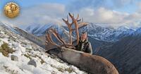 man with caribou