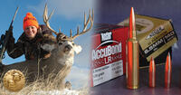 hunter with deer and ammo