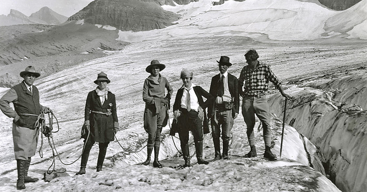 Grinnell, second from right, and hiking party on Grinnell Glacier.